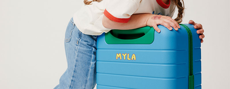 An Away suitcase with digital printing on the back of the suitcase